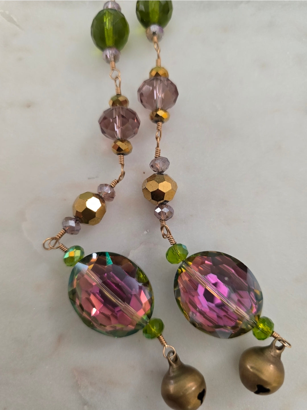 Shoulder tickler irredesent purple green and gold earrings
