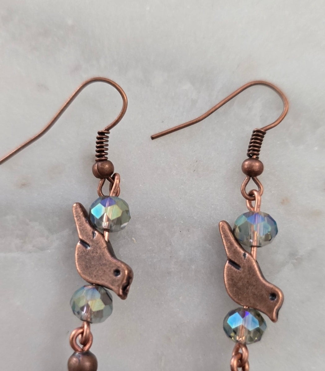Copper bird blue sand glass earrings.