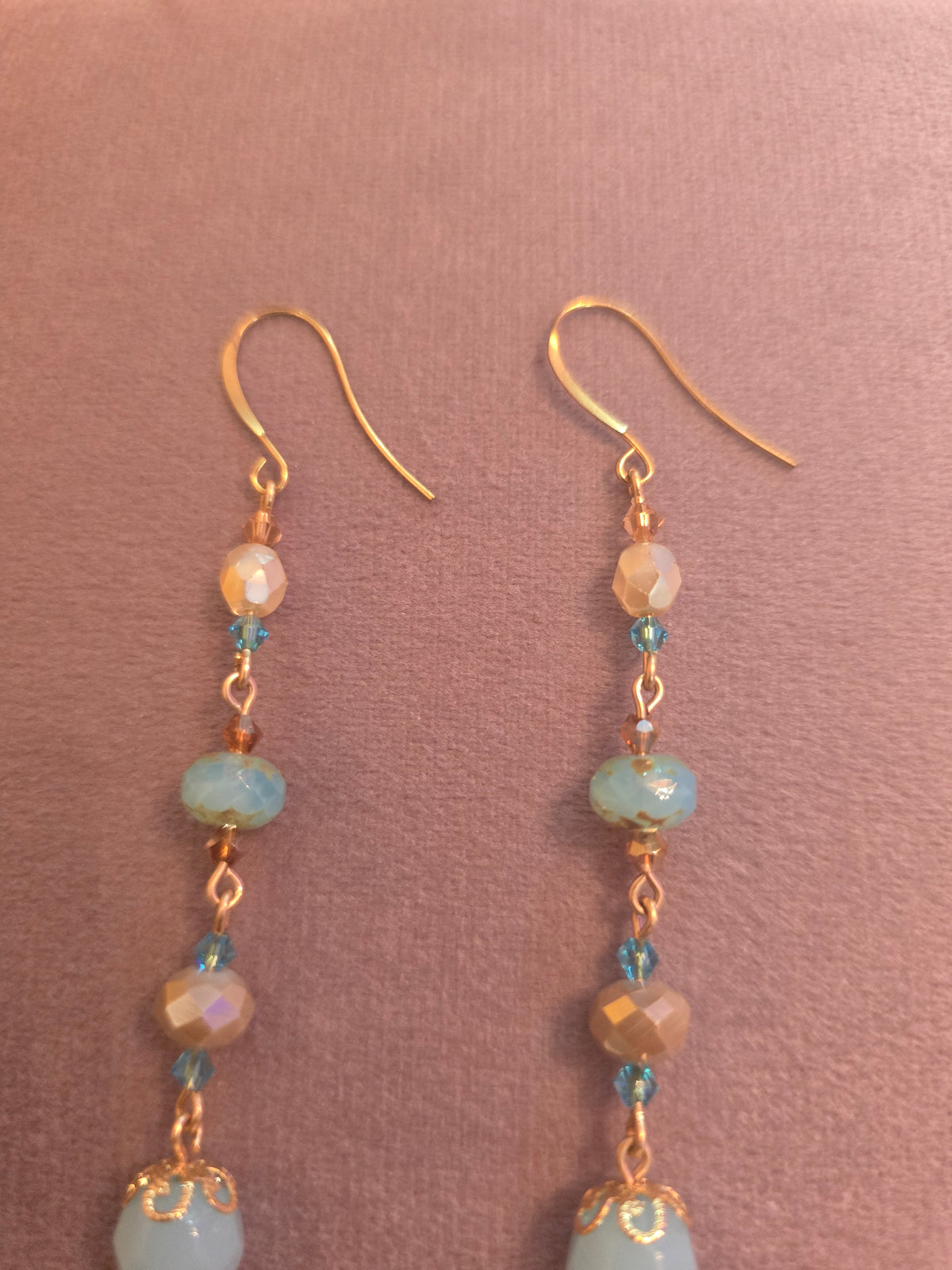 Shoulder tickler shell birdy earrings blue and dark cream