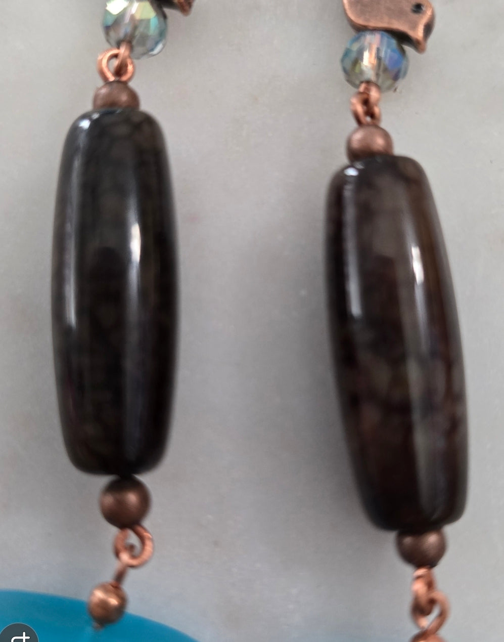 Copper bird blue sand glass earrings.