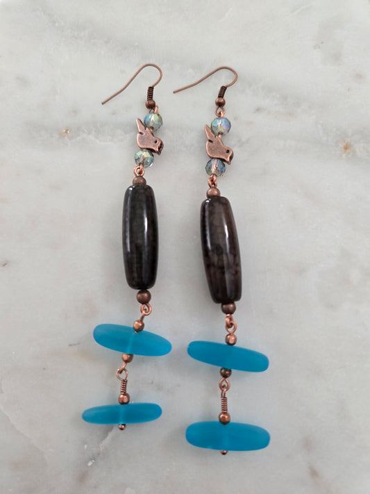 Copper bird blue sand glass earrings.