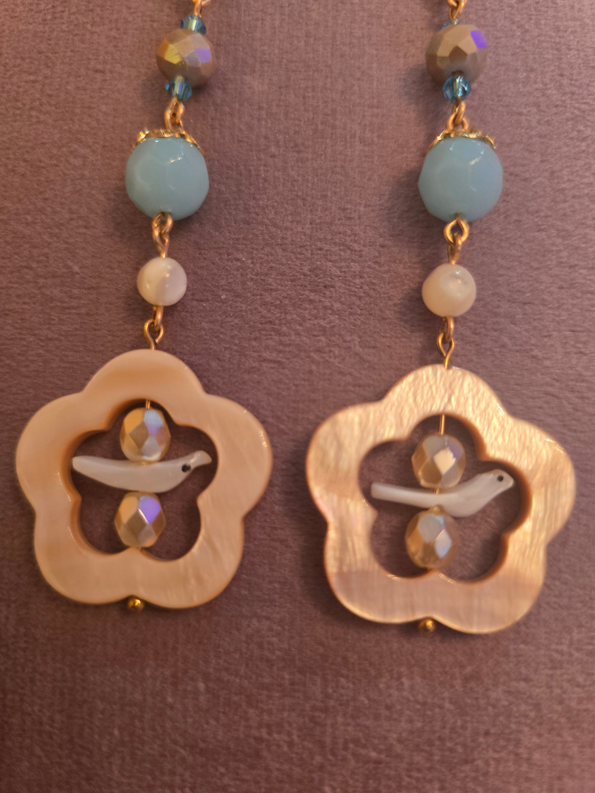 Shoulder tickler shell birdy earrings blue and dark cream